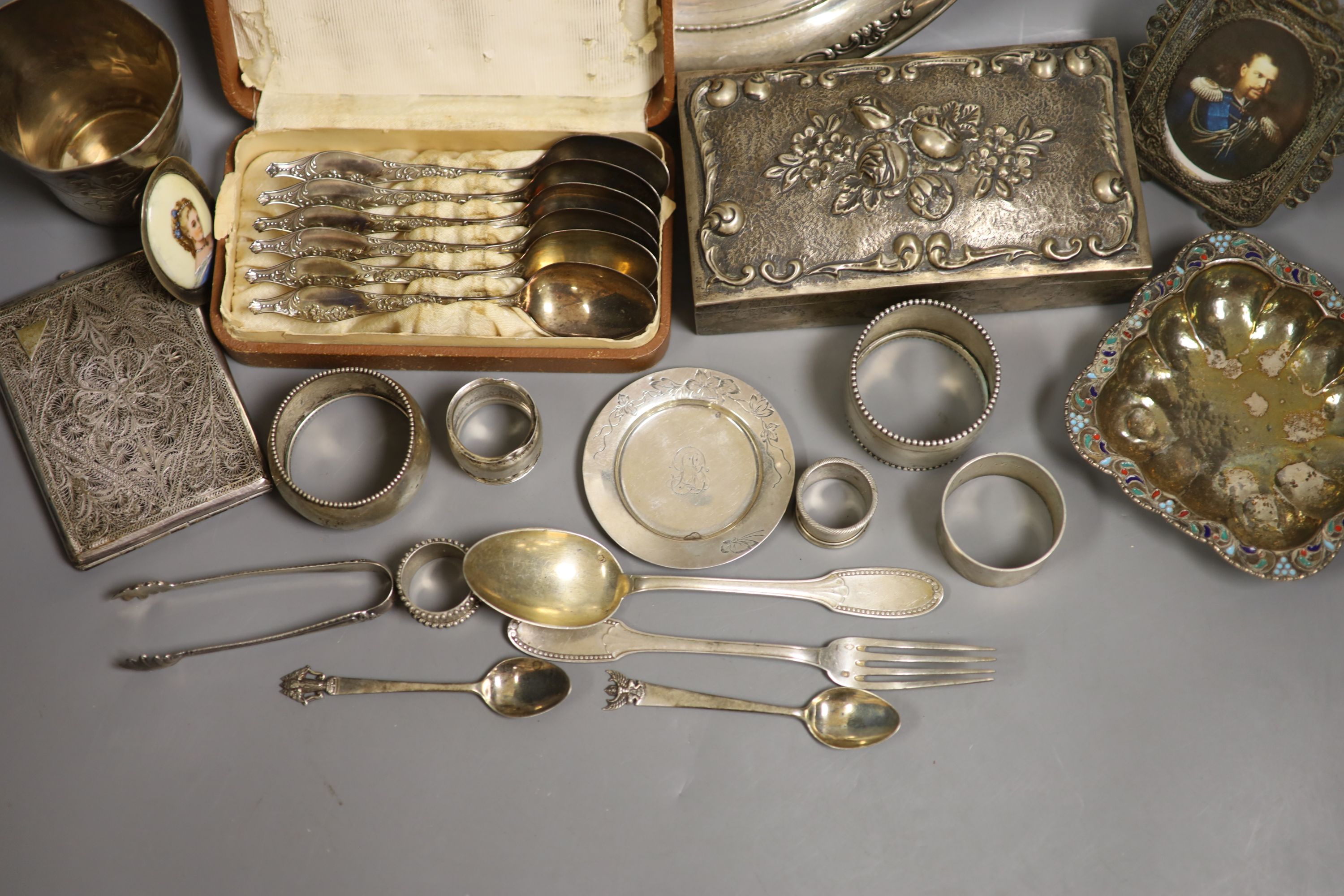 A collection of continental white metal items including 800 cigarette box, sterling plate, Tiffany & Co small dish, flatware etc.